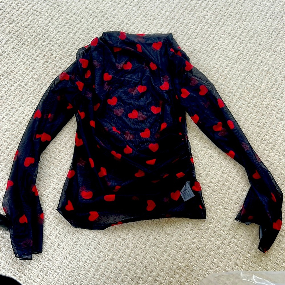 Long sleeved mesh mock turtleneck runched blouse